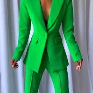 Beautiful green pants suit.